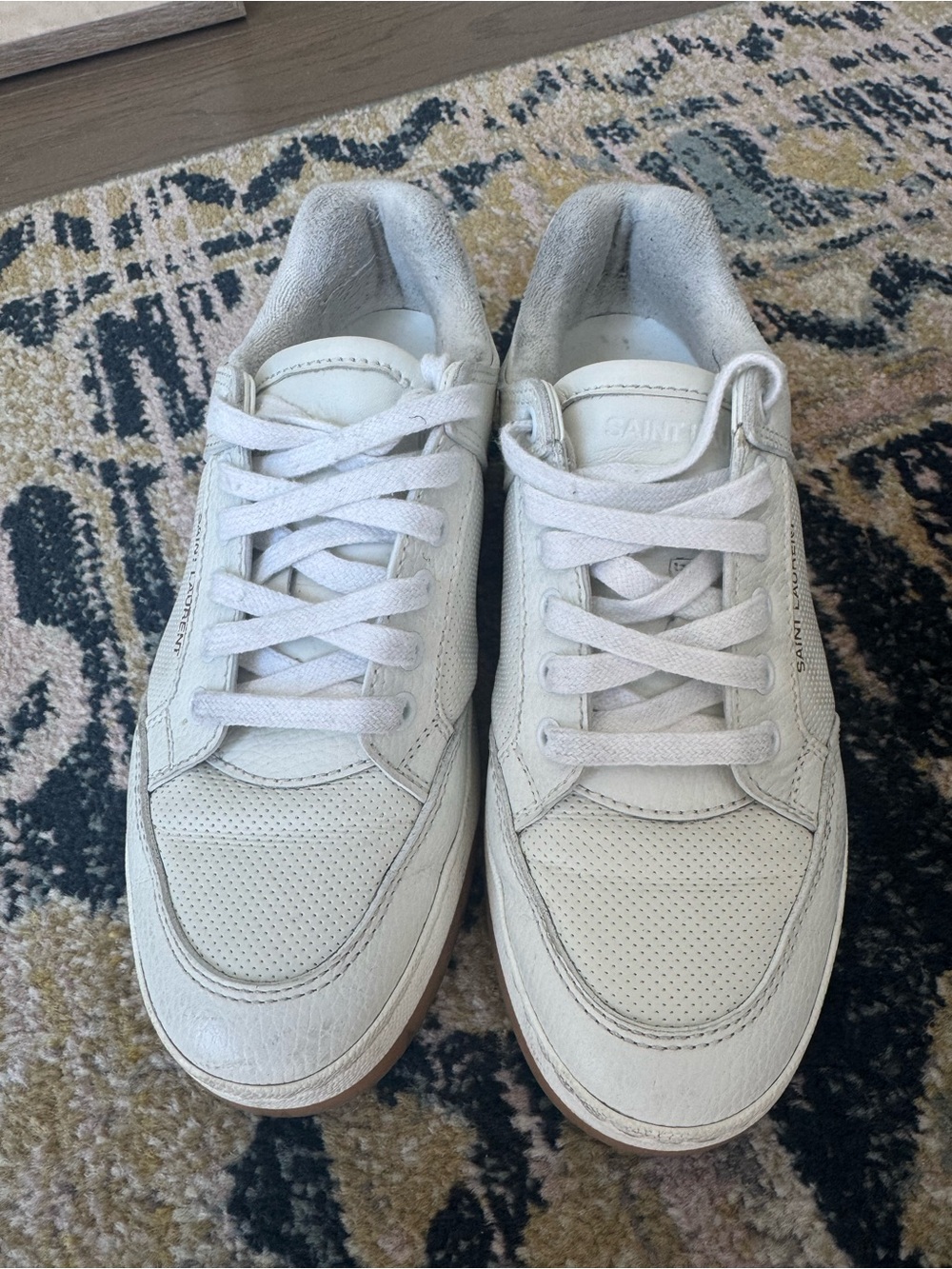Saint Laurent Women’s White Leather Low-Top Sneakers.